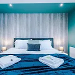 Rest & Recharge At The Station Apartments