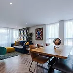 Cohost Partners Stylish Retreat With City Views