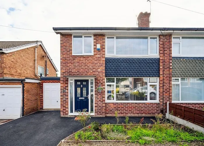 House In Heald Green Village