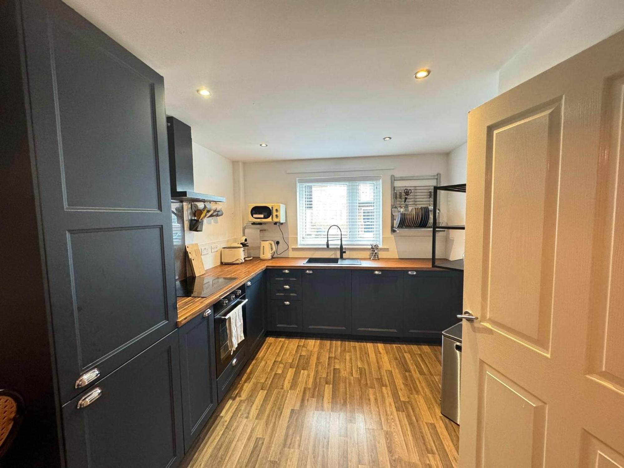 Modern King Bedroom Near Etihad Stadium & The Coop Live