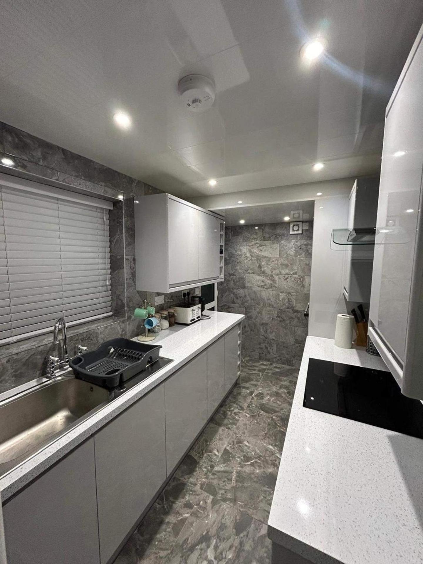Housesleeps9-fireplace-garden-bbq-tv Vakantiehuis Manchester